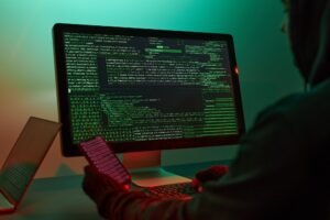 Cyber war. Hacker breaking security. Anonymous person access sensitive data. Cyber attack. Coding