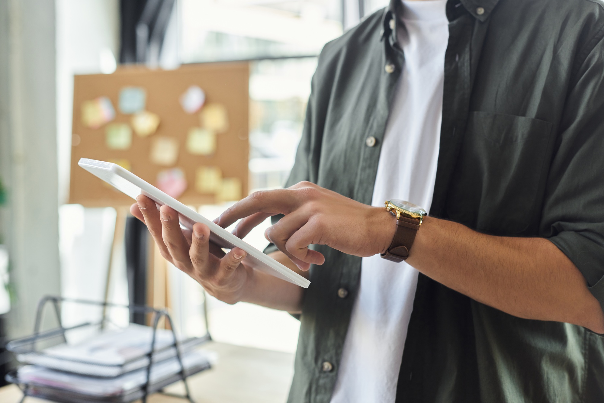 Engaging in productive work at a modern office with a focus on technology and collaboration